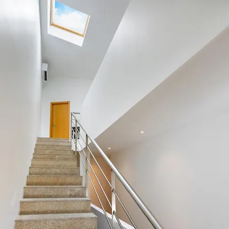 Апартаменти C'est Maison Bleue *